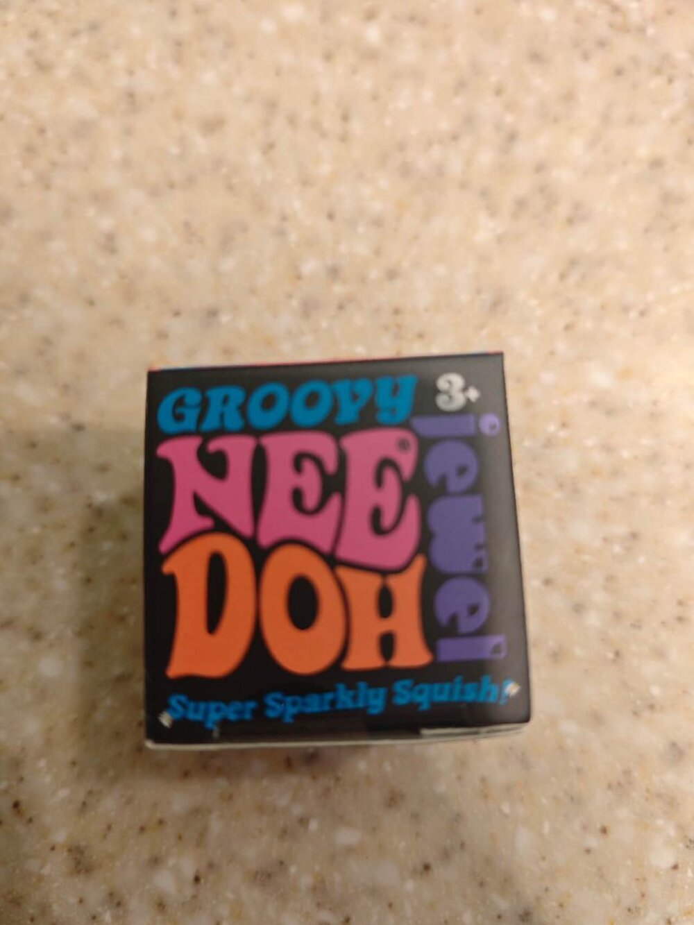 Nee Doh® Groovy Jewel Sparkly Squish Toy - blue - 1.25"